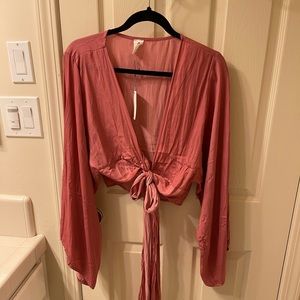 NEW WITH TAGS. Mauve colored tie top. Sm/med. bundle to save.